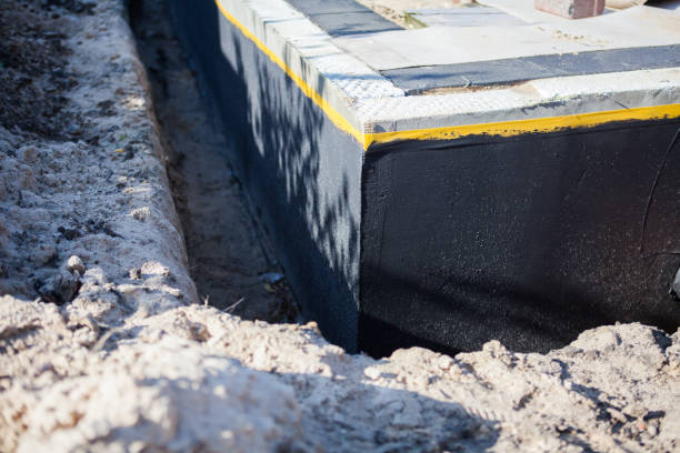 Professional Waterproofing technician working in Fairview, NC